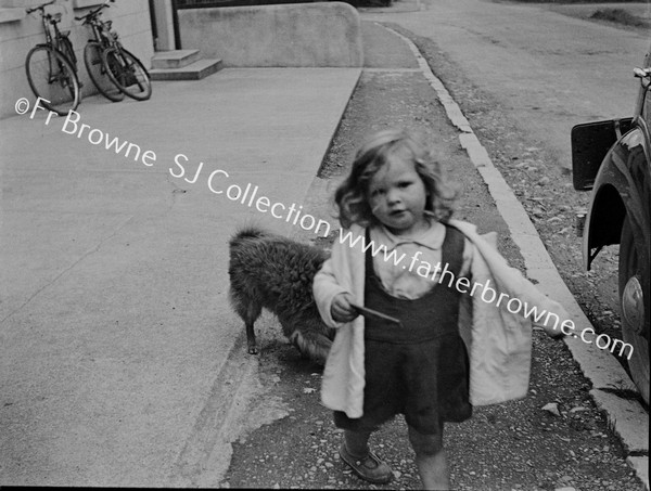 LITTLE GIRL WITH DOG